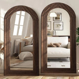 Pair of arched full-length mirrors with solid wood frames, 71x32, in a farmhouse living room.